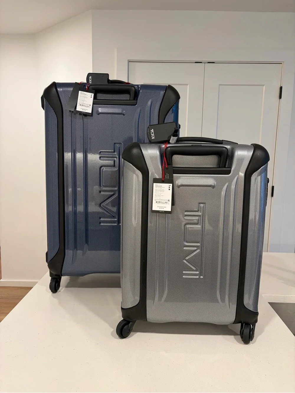 Tumi Hard Shell Spinner Luggage Set in Blue and Silver